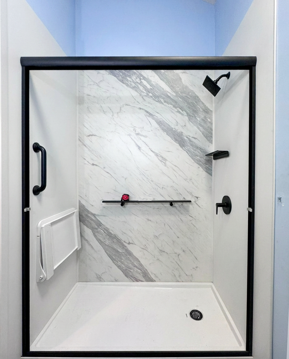 After — Tub-to-shower · marble-look walls
